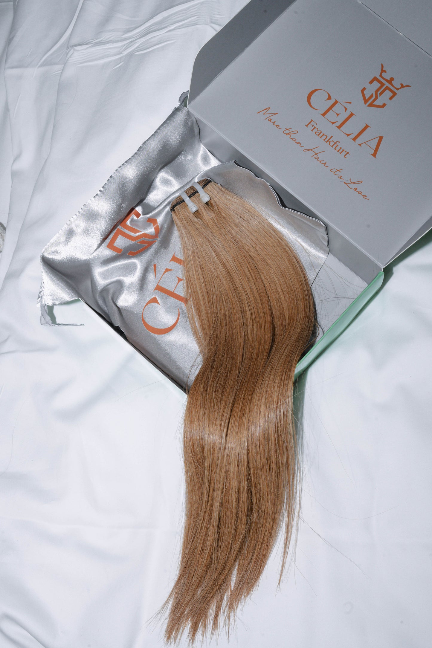 Weft of premium 100% human hair sourced from Vietnam, featuring natural texture and available in a range of colors for seamless extensions.