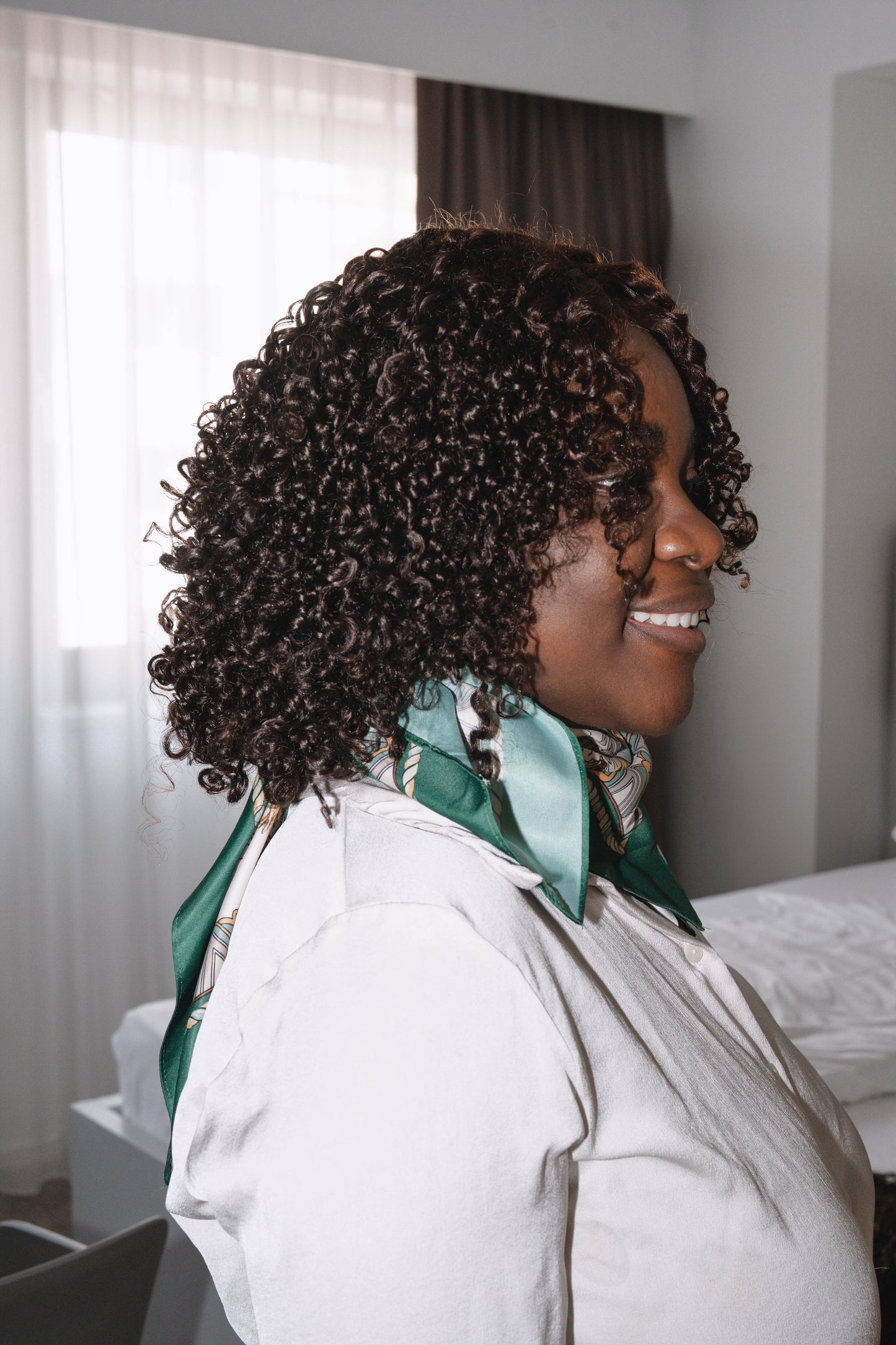 Close-up of transparent 5x5 HD lace closure showing natural-looking hairline and pre-plucked baby hairs