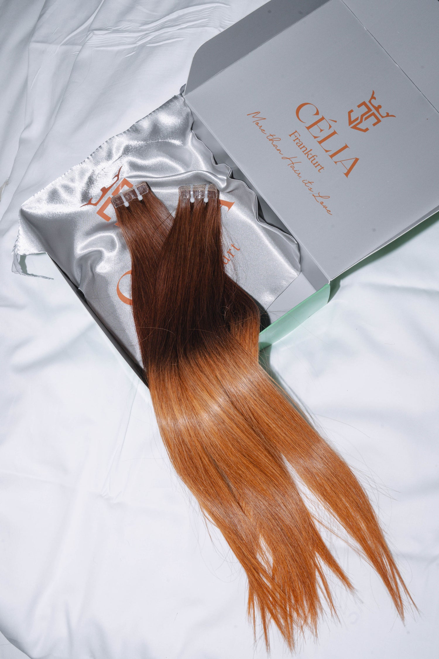 Tape-in extensions made from 100% human hair sourced from Vietnam, offering a discreet, long-lasting solution for adding volume and length with easy application.