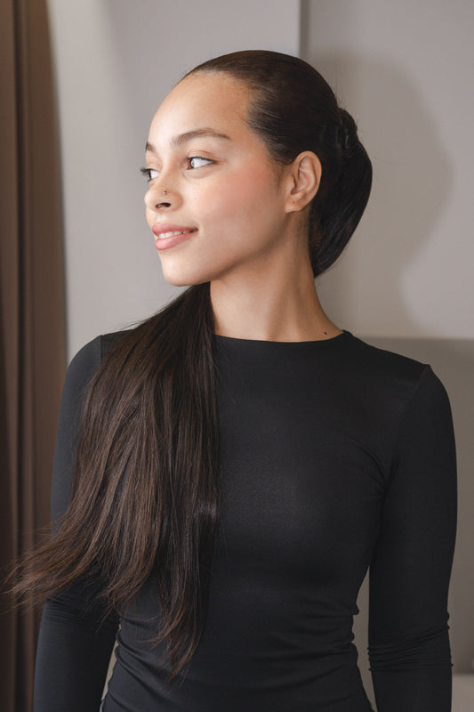 22-inch Bone Straight ponytail made of 100% raw human hair in natural black (Color 1B), sleek and silky texture, 100g