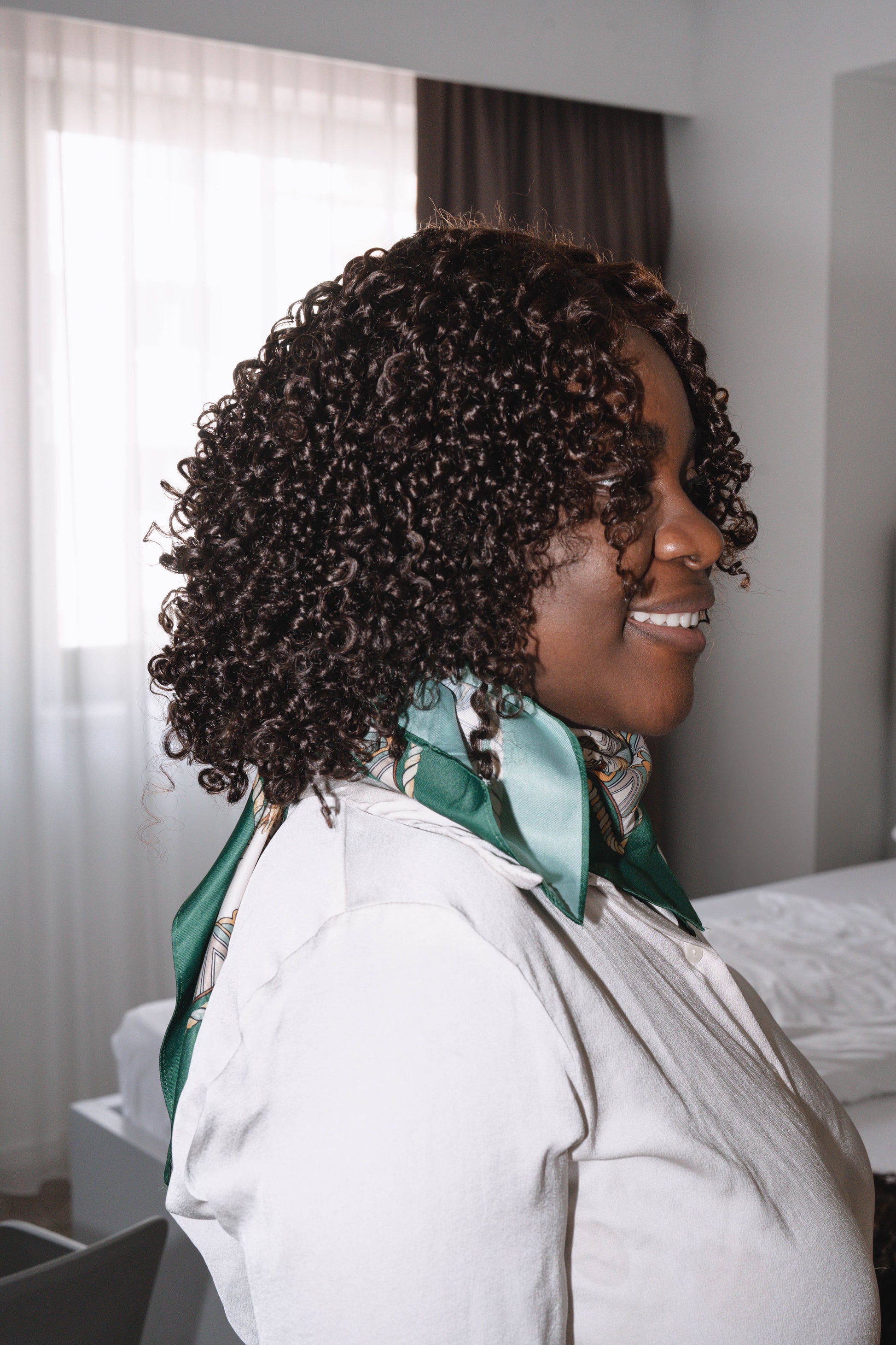Close-up of transparent 5x5 HD lace closure showing natural-looking hairline and pre-plucked baby hairs