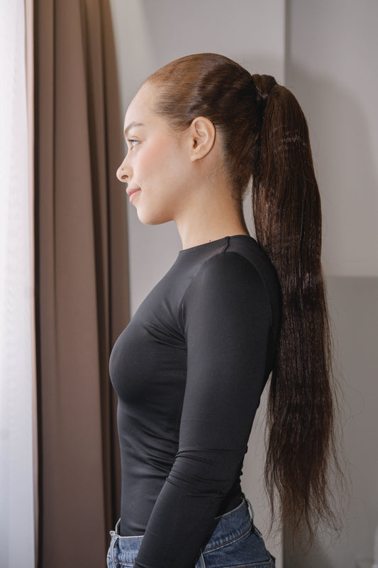 22-inch Yaki ponytail made of 100% raw human hair in color 4 (medium brown), 100g, with natural texture and fullness